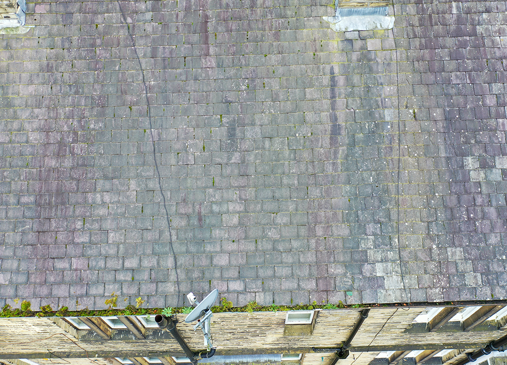 Glasgow Gutter Cleaning, Aerial drone photo of a victorian house with blocked guttering
